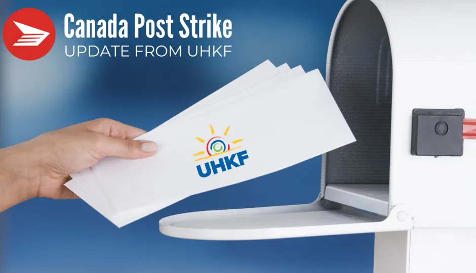 Image of a hand putting mail in the mailbox with a UHKF logo on the envelope.